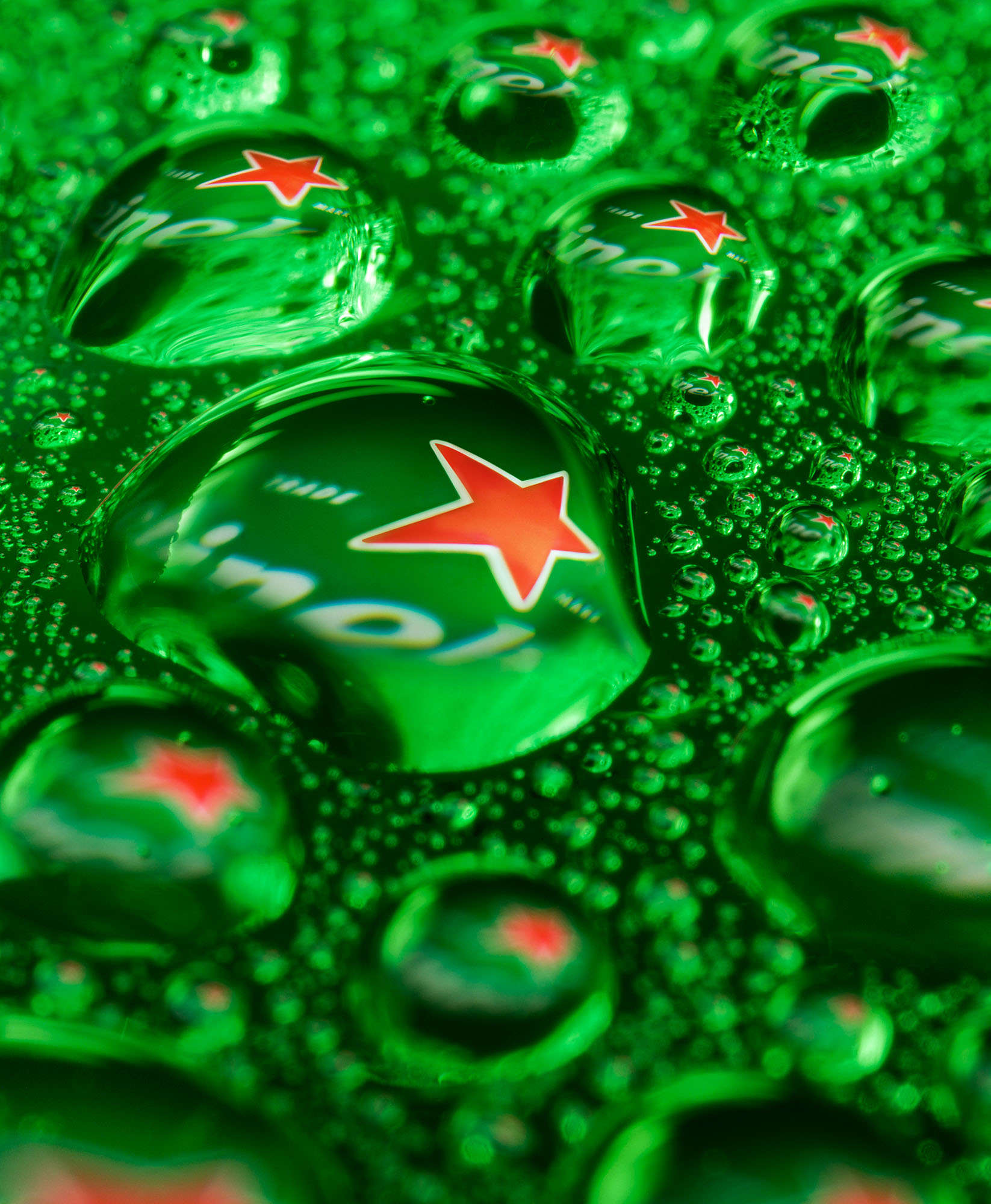 Heineken Logo Reflected In Droplets