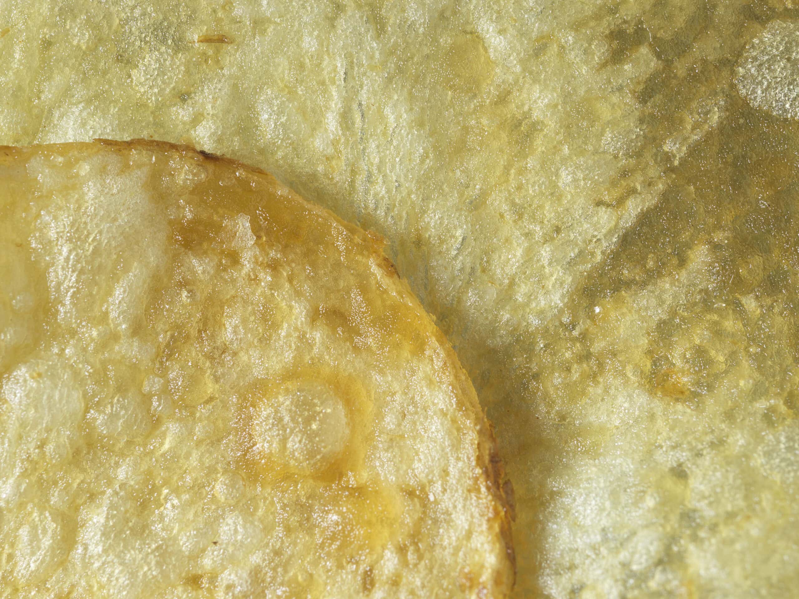 Macro image of plain kettle crisps
