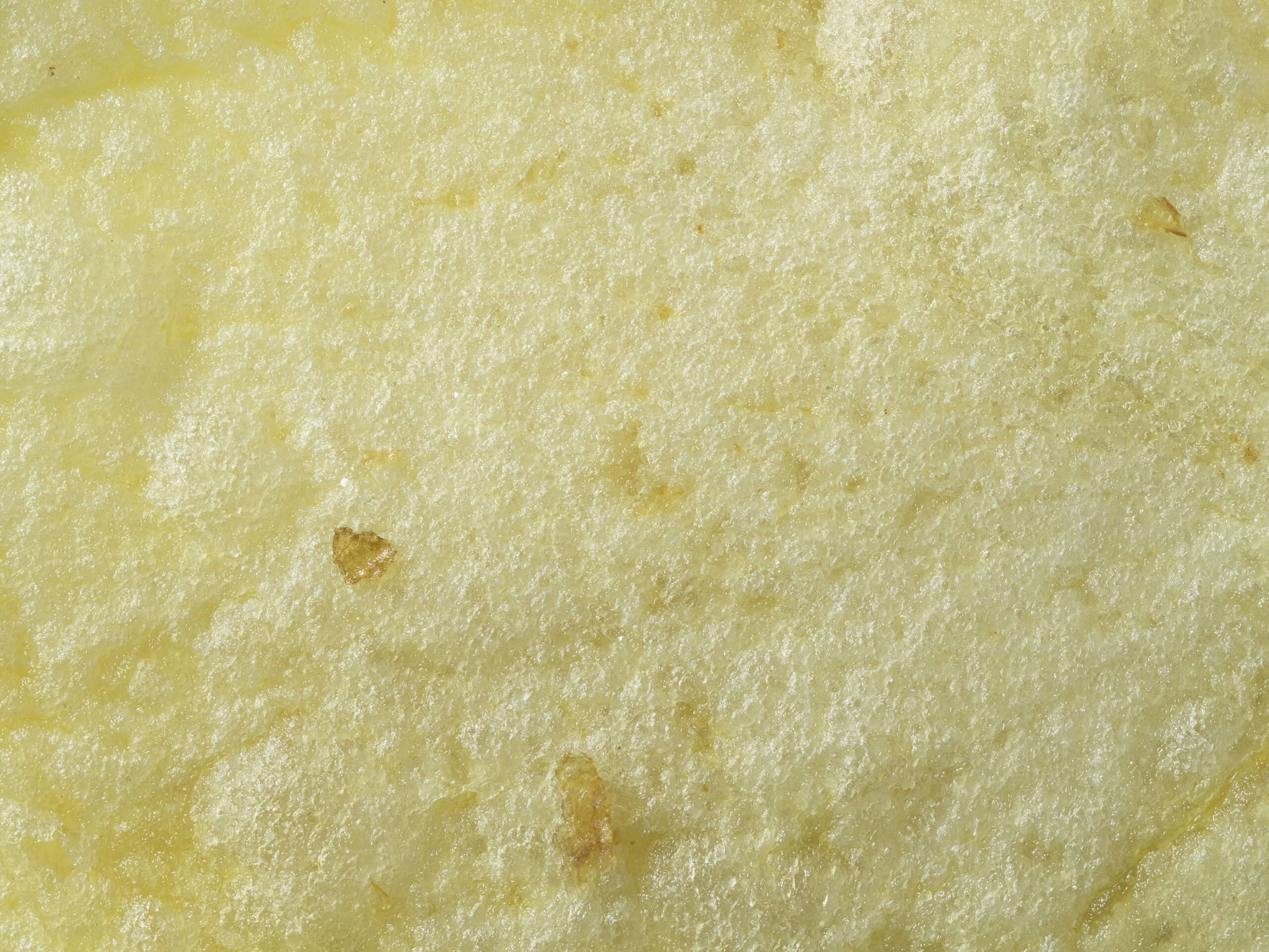 Macro image of a ready salted Walkers crisp