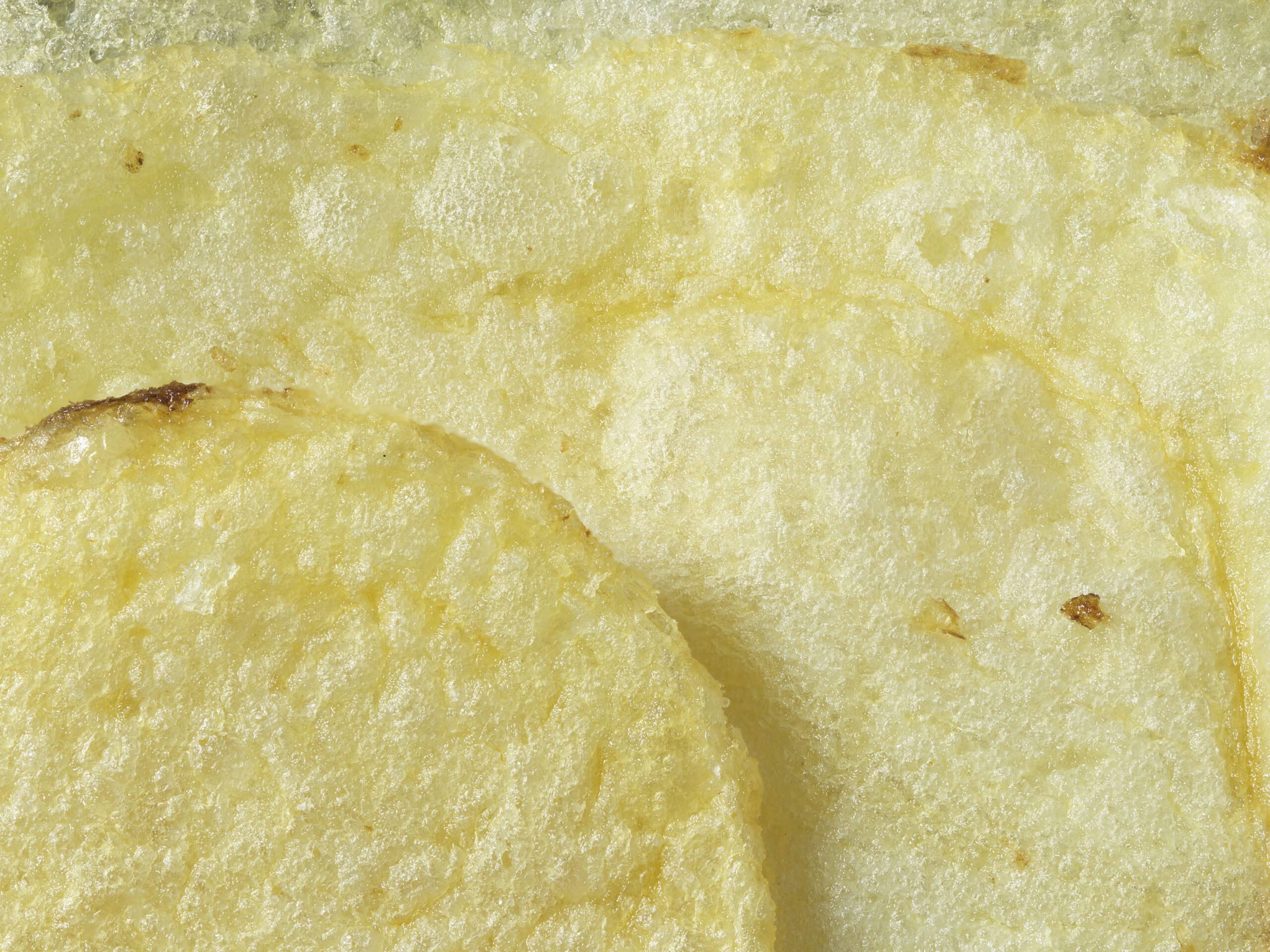 Macro image of a ready salted Walkers crisp