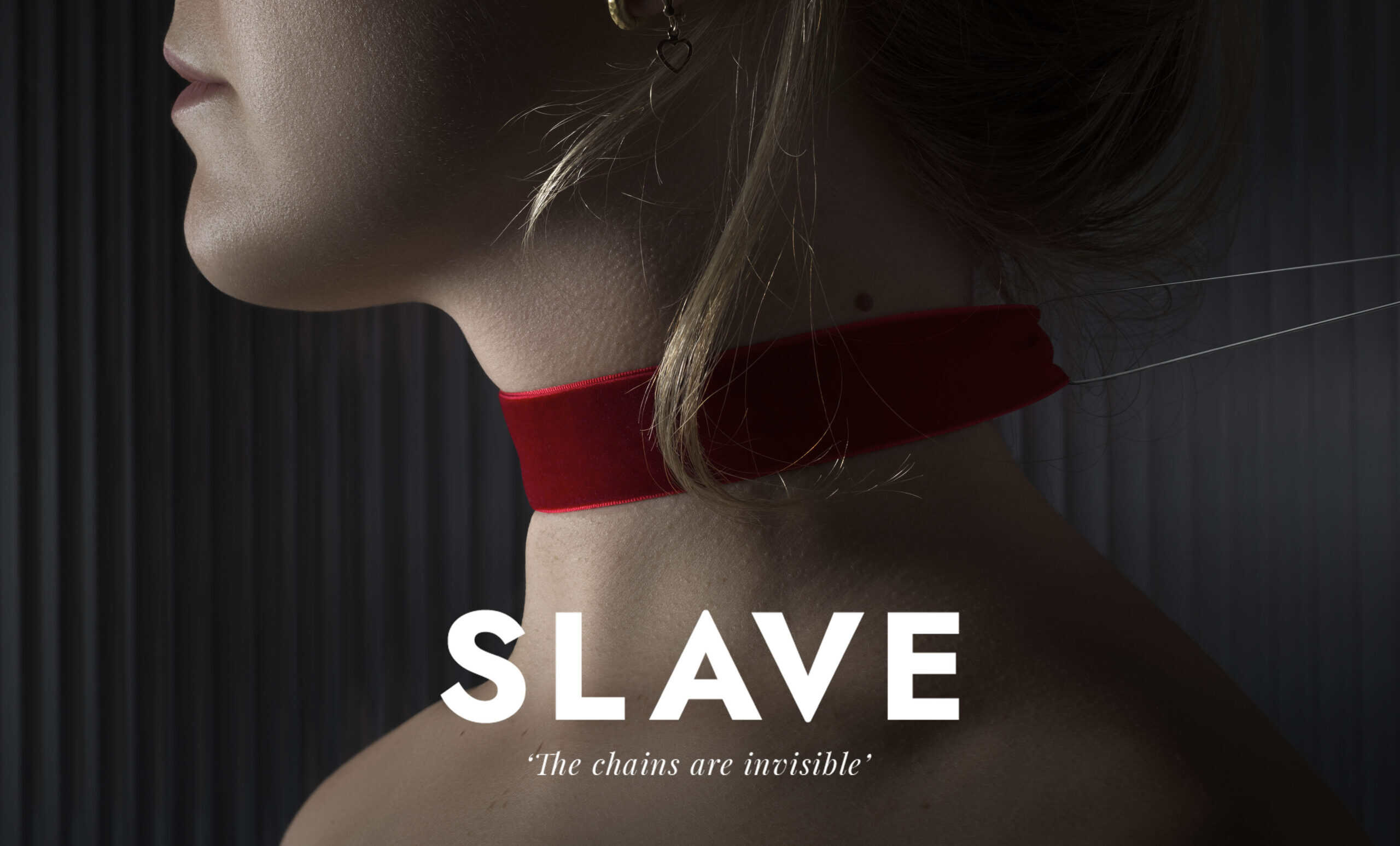 Female neck with choker being pulled from behind with nylon wire