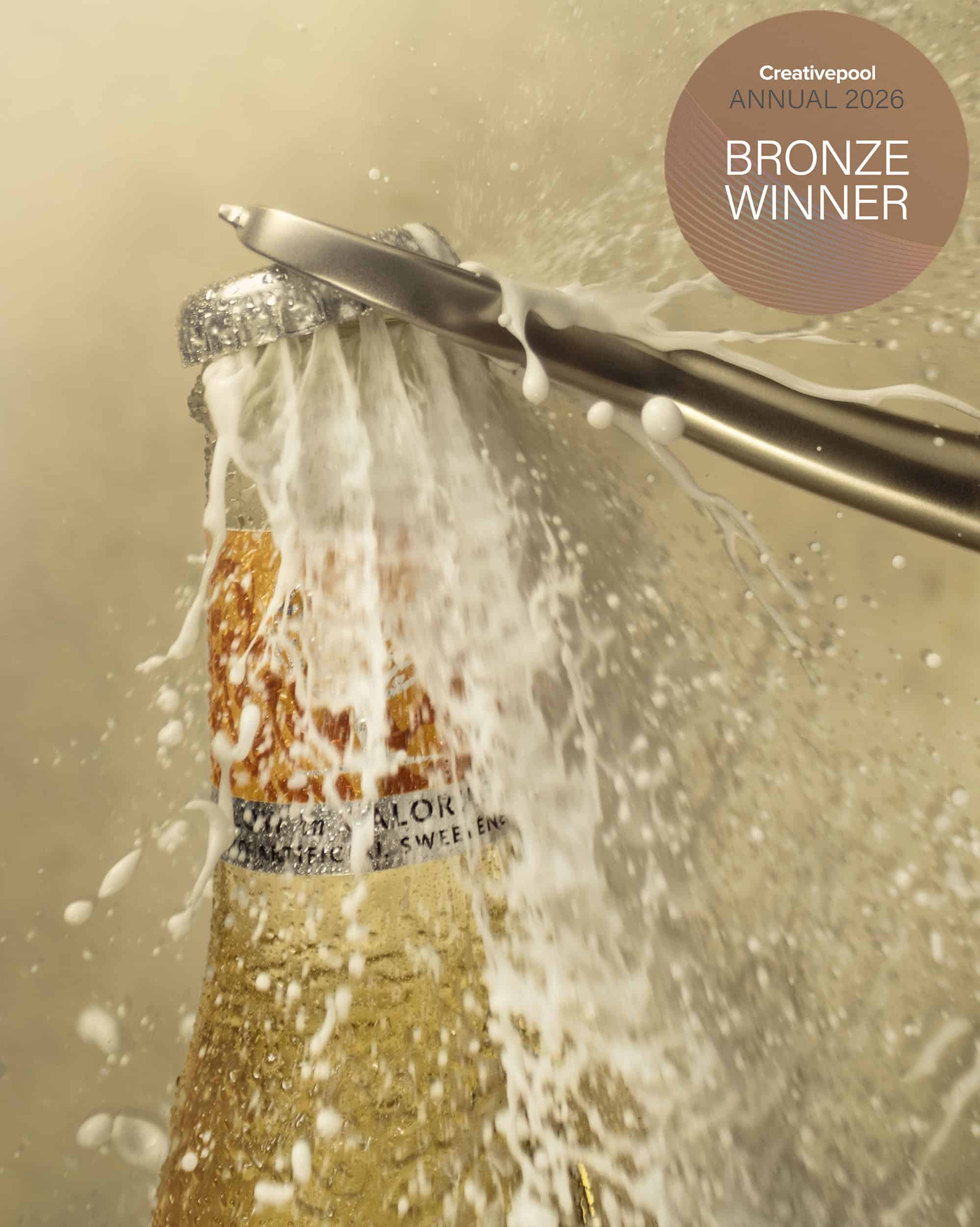 Close-up of a bottle of FeverTree Ginger Ale opening. Shot by Drinks Photographer, Jonathan Knowles.