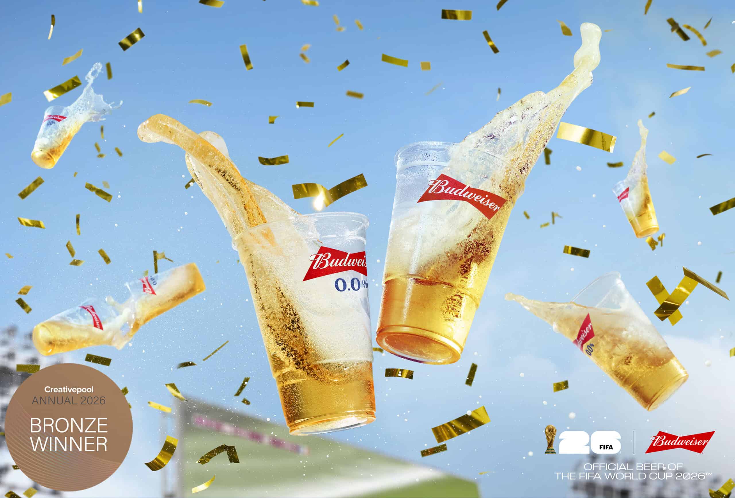 Cups of Budweiser being thrown in the air at the FIFA World Cup 2026 shot by drinks photographer, Jonathan Knowles